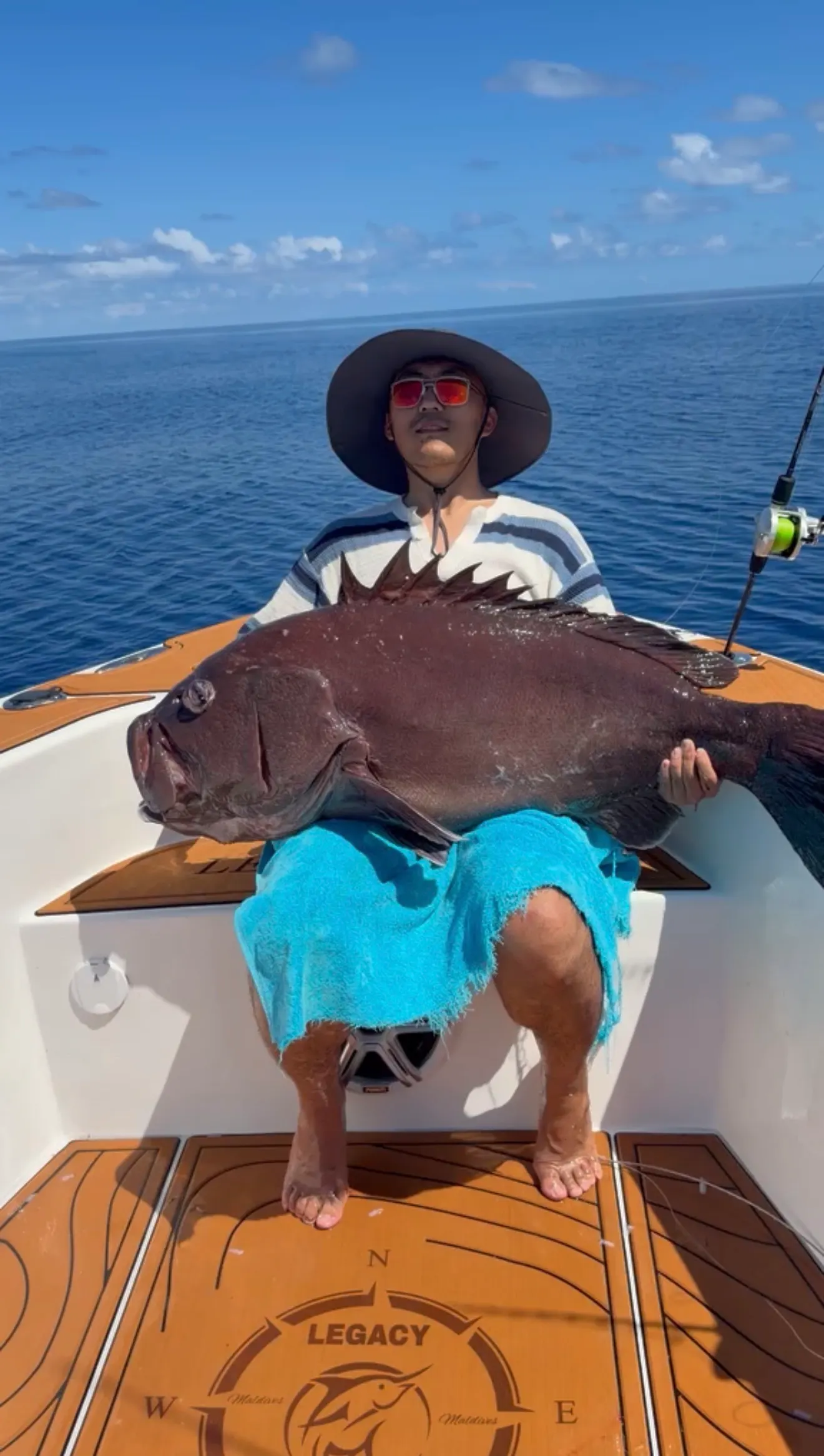 Guest with a big catch on a fishing trip