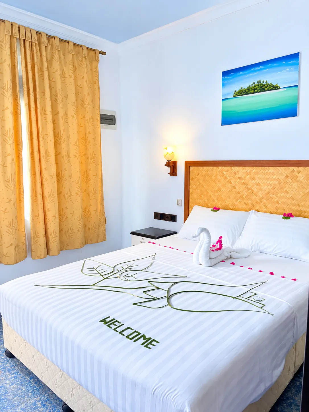 Guest room with a freshly made double bed